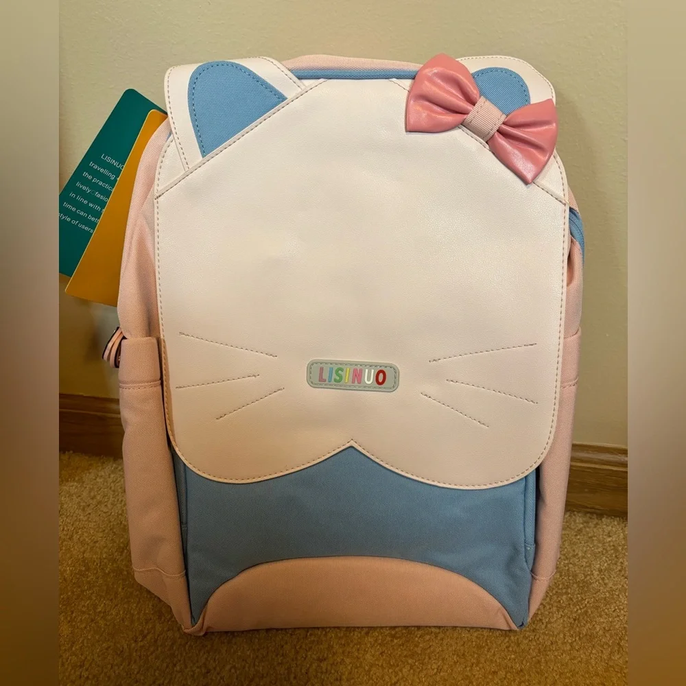 hello kitty blue bow backpack AI ACCESSORY INNOVATIONS Kawaii Backpack, 16 Allover Print with 3D Iconic Hello Kitty it keeps your essentials safe and sound Denim blue/Hello Kitty Appliqud Backpack